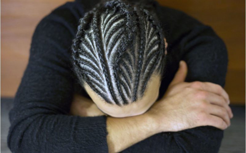 Black man braids helping answer "what is a durag?"