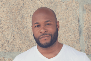 bald black man