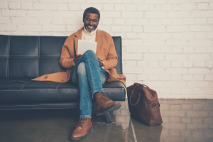 black man waiting at the airport