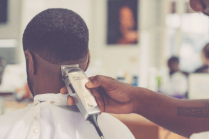 black man getting haircut