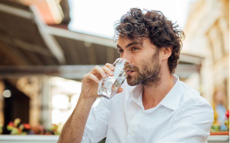 Curly haired man with bangs