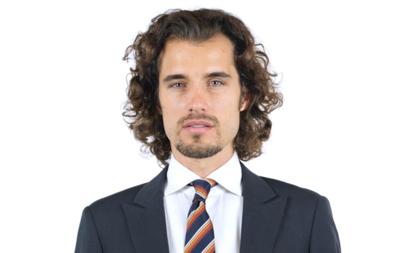 Slicked Back Curls Hairstyle on a Man