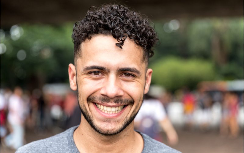 Spiral Curls With Fade on a curly hair man